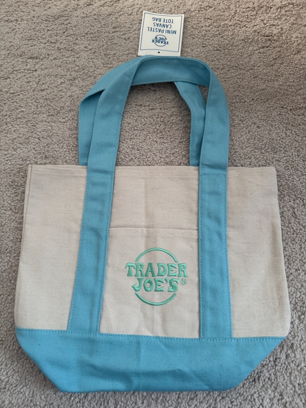 Trader Joe's Cream Tote Bag with Blue Handles